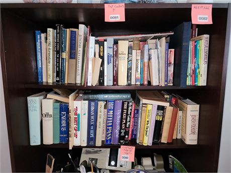 Two Shelves of Mixed Hardcover and Paperback Books