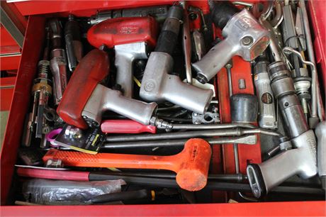 Mixed Pneumatic and Hand Tools in Red Toolbox Drawer
