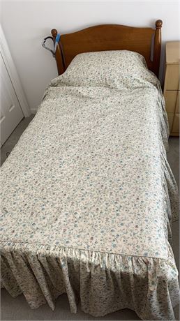 Sealy Posturepedic Twin Bed with Floral Bedding