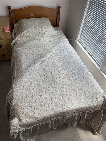 Wooden Twin Bed Frame with Floral Bedding